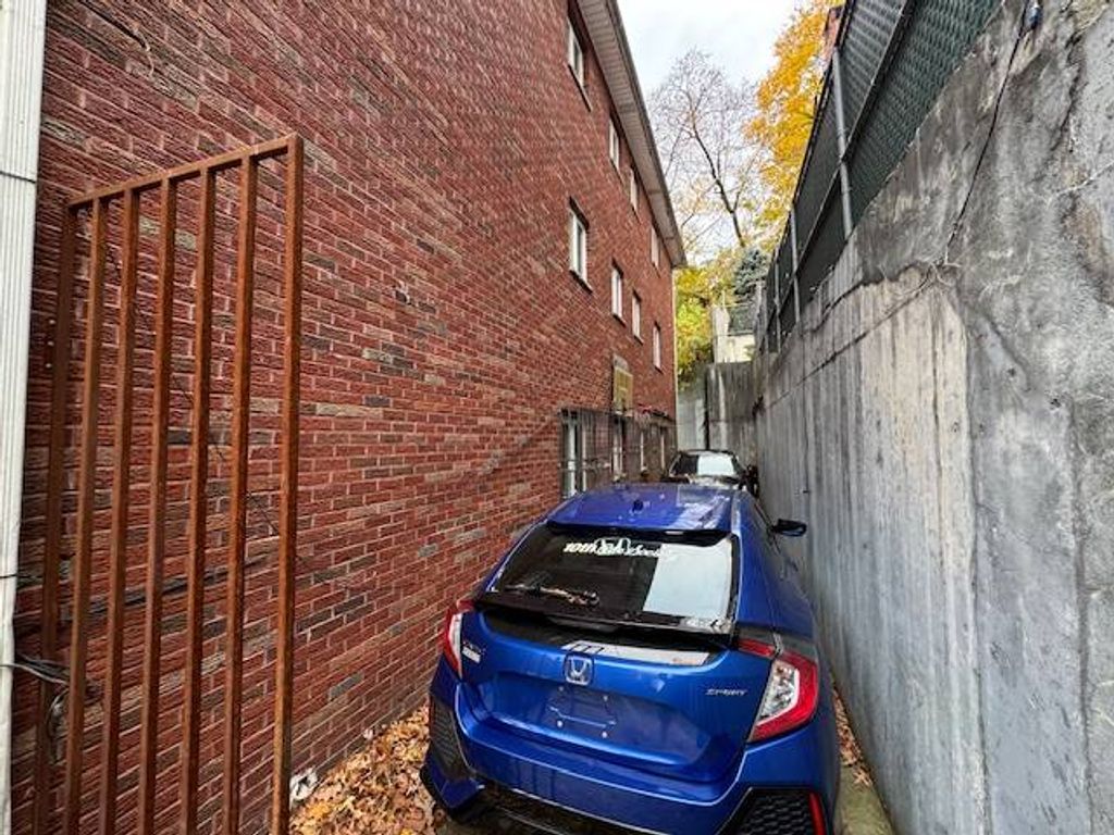 Photo of 8666 Midland Parkway, Jamaica Estates, NY 11432 (MLS # 11621367)