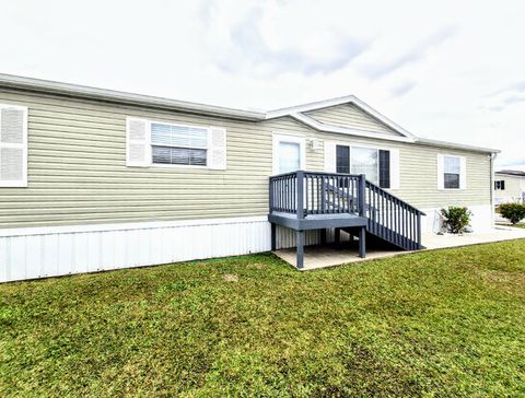 Photo of 3857 Covington Dr, Saint Cloud, FL 34772 (MLS # 11634540)