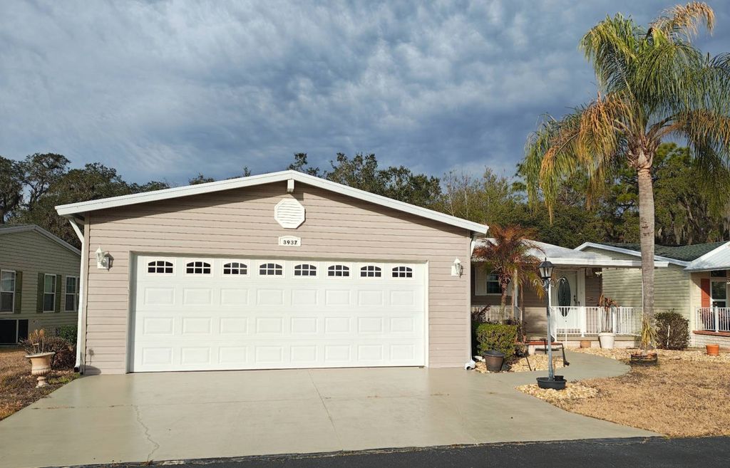 Photo of 3937 Southport Springs Parkway, Zephyrhills, FL 33541 (MLS # 11652492)