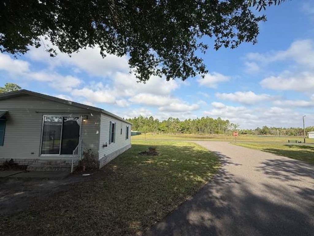 Photo of 2306 Holmes Drive, Lake Wales, FL 33898 (MLS # 11679065)