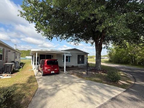 Photo of 2306 Holmes Drive, Lake Wales, FL 33898 (MLS # 11679065)