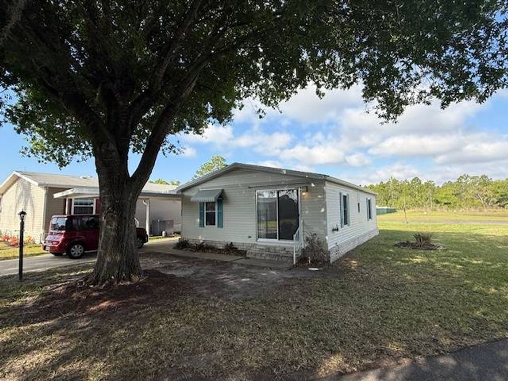 Photo of 2306 Holmes Drive, Lake Wales, FL 33898 (MLS # 11679065)
