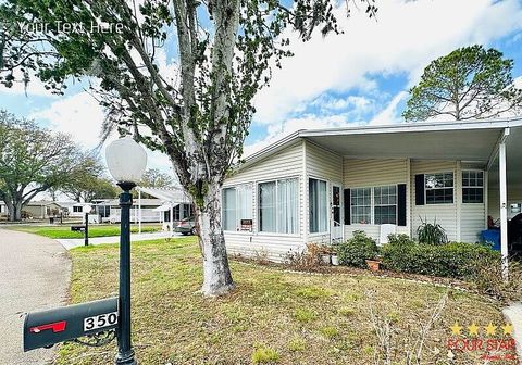 Photo of 350 Kingslake Dr, DeBary, FL 32713 (MLS # 11675586)