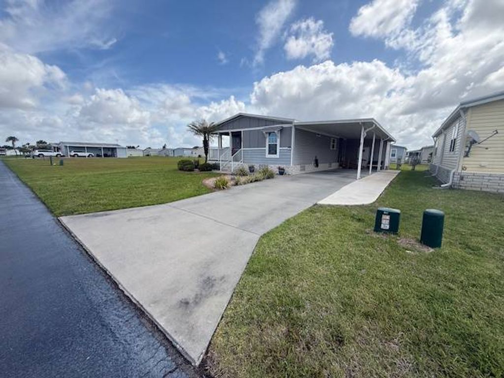 Photo of 1363 Whispering Pines Drive, Frostproof, FL 33843 (MLS # 11683327)
