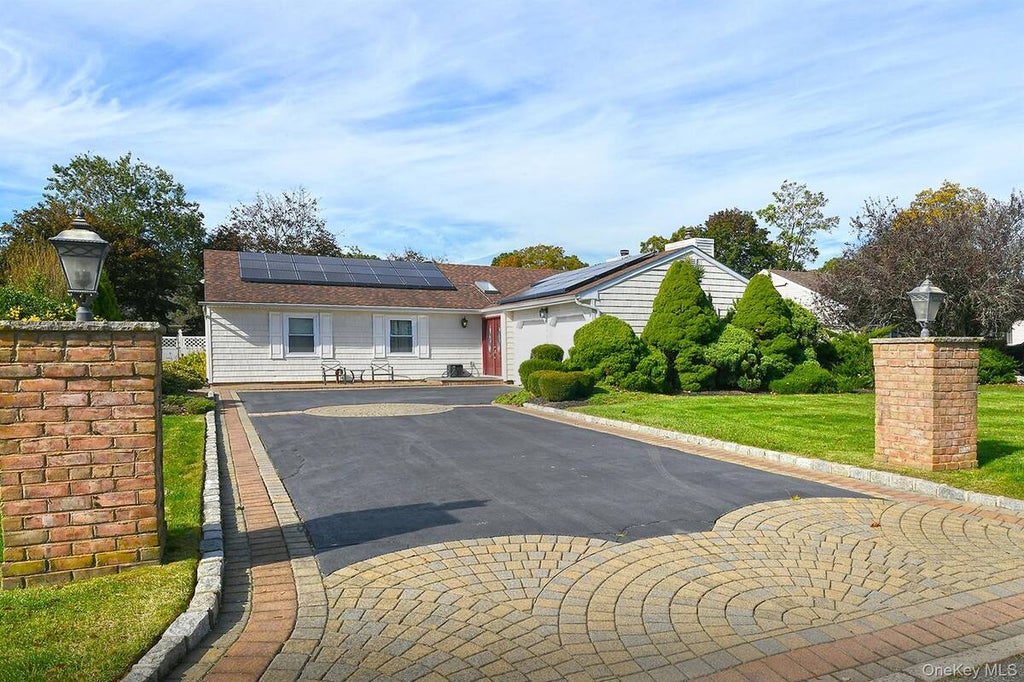 Photo of 22 Apple Blossom Lane, East Patchogue, NY 11772 (MLS # 11933134)