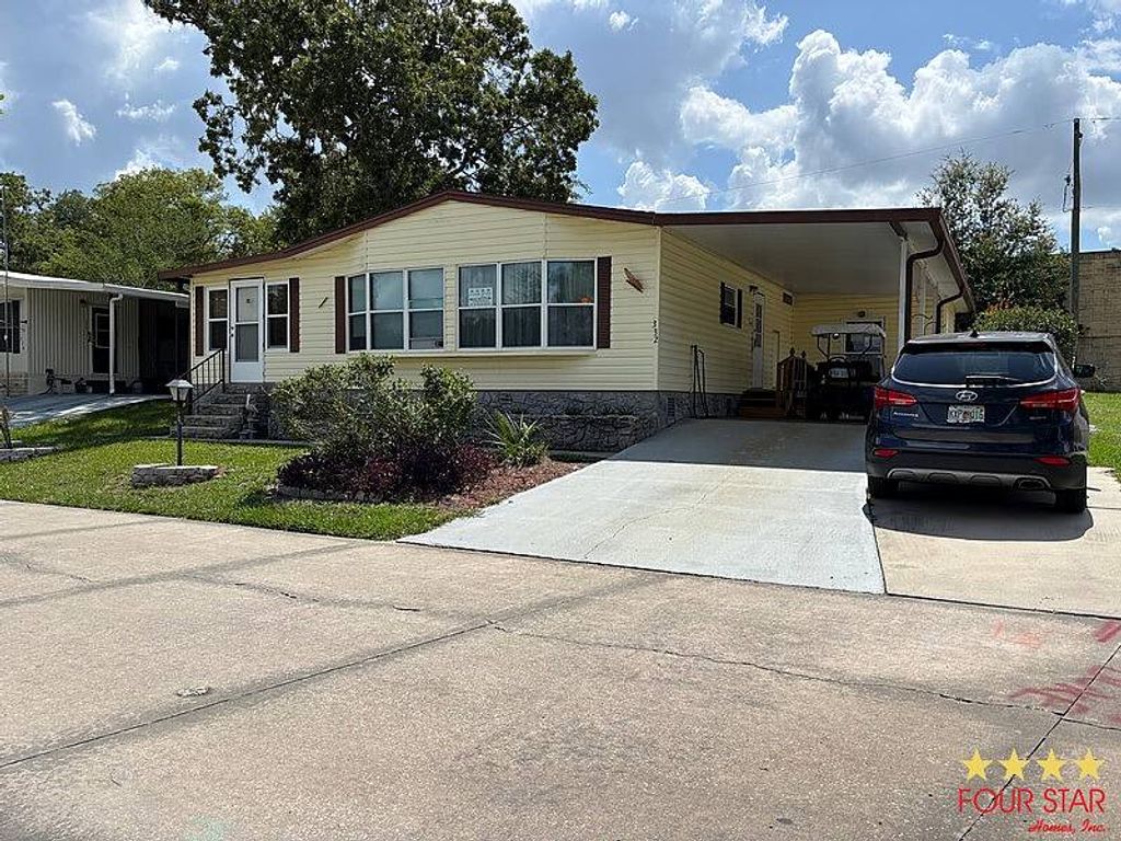 Photo of 332 Pineview Dr, Orange City, FL 32763 (MLS # 11863171)