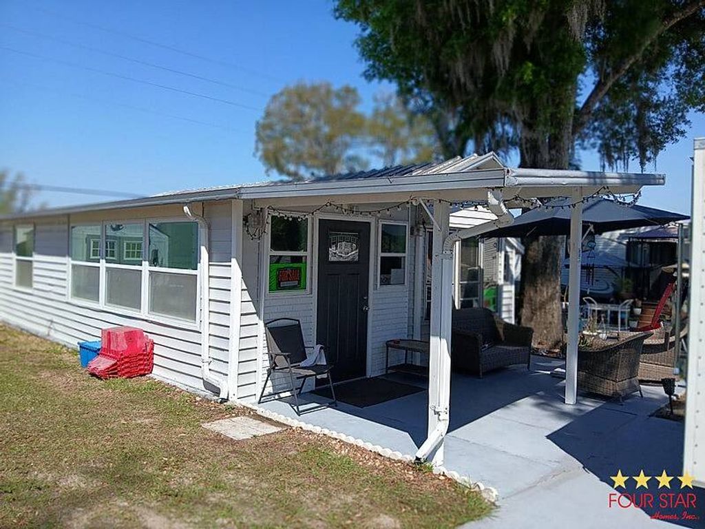 Photo of 221 Cedar Village Sr St, Orange City, FL 32763 (MLS # 11684106)