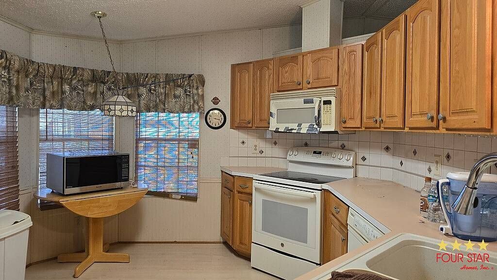 Photo of 5506 Nerissa Ln #1327, Orlando, FL 32822 (MLS # 11654222)