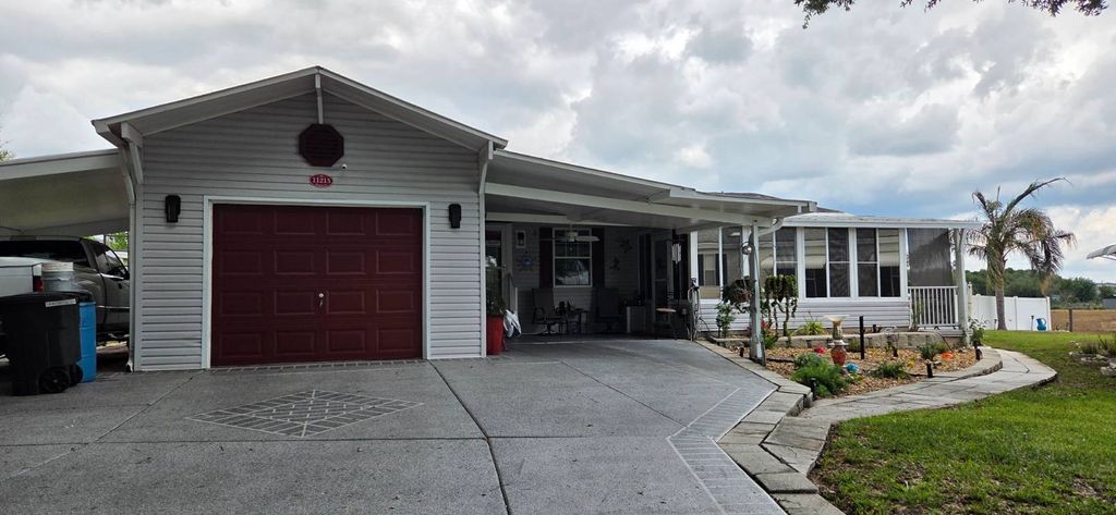 Photo of 11215 Mesquite Dr, Dade City, FL 33525 (MLS # 11774546)