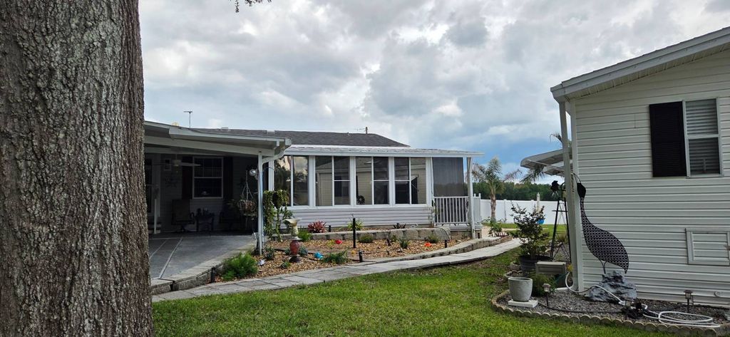 Photo of 11215 Mesquite Dr, Dade City, FL 33525 (MLS # 11774546)