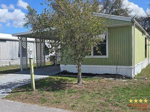 Photo of 1004 Lakeshore Dr #34, Wildwood, FL 34785 (MLS # 11669465)