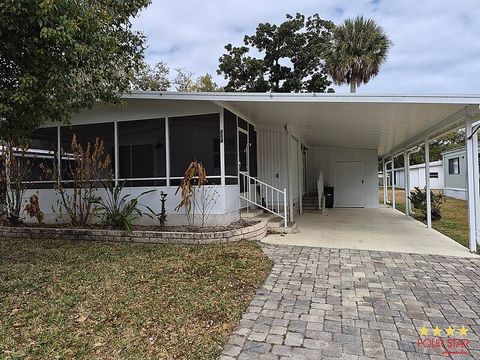 Photo of 104 Flamingo Dr, Port Orange, FL 32127 (MLS # 11671464)