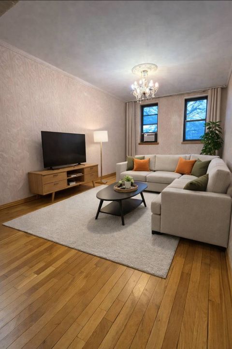 Photo of 8401 Main St #311, Queens, NY 11435 (MLS # 11654592)