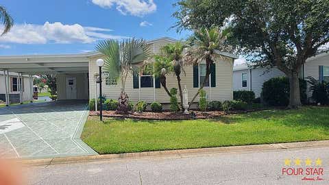 Photo of 246 Blue Heron Lake Cir, Ormond Beach, FL 32174 (MLS # 11855435)
