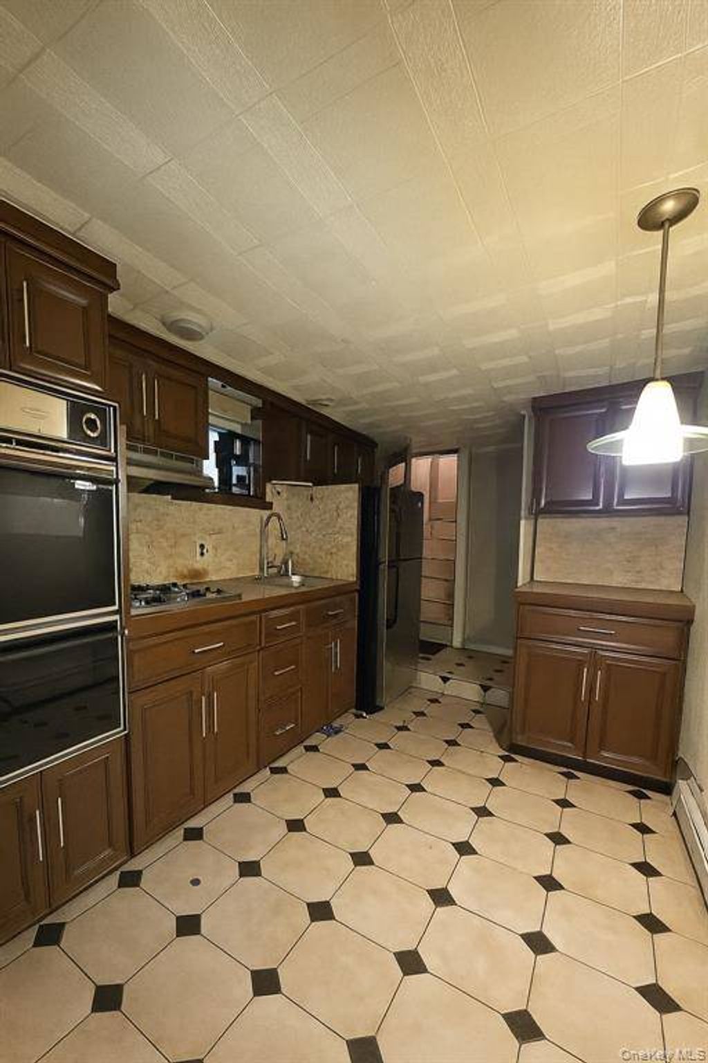 Photo of 9732 84th St, Ozone Park, NY 11416 (MLS # 11613095)