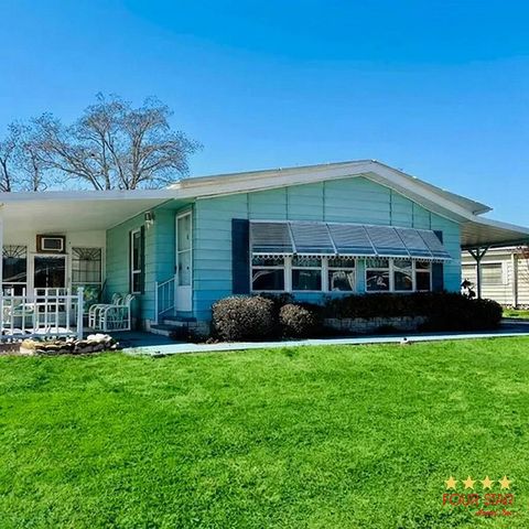 Photo of 83 Sea Fern Dr #111, Leesburg, FL 34788 (MLS # 11652487)