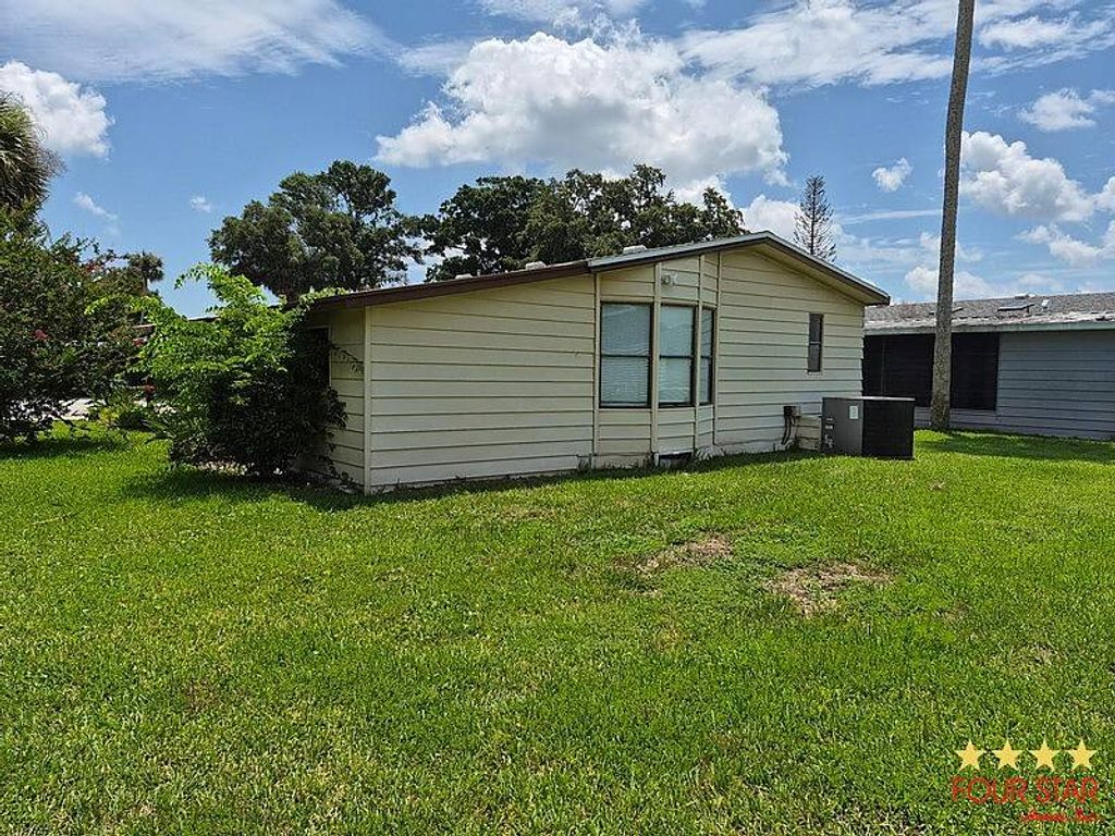 Photo of 2276 Mariposa Ave, Port Orange, FL 32129 (MLS # 11850215)