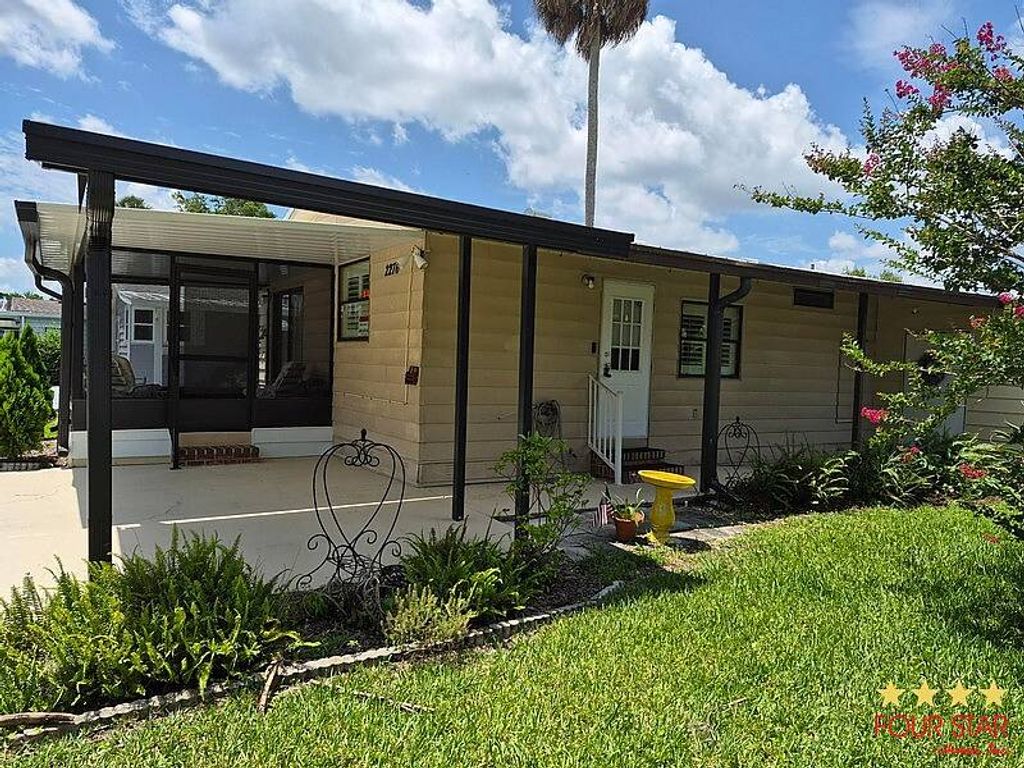 Photo of 2276 Mariposa Ave, Port Orange, FL 32129 (MLS # 11850215)