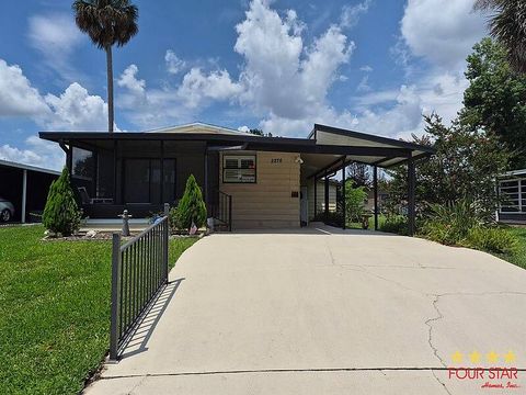 Photo of 2276 Mariposa Ave, Port Orange, FL 32129 (MLS # 11850215)
