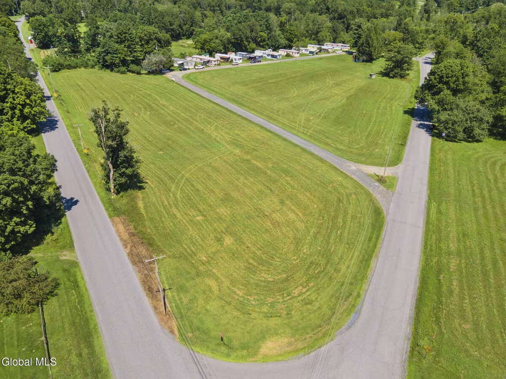 Photo of 11 Whitecreek Shunpike Road, White Creek, NY 12816 (MLS # 11926410)