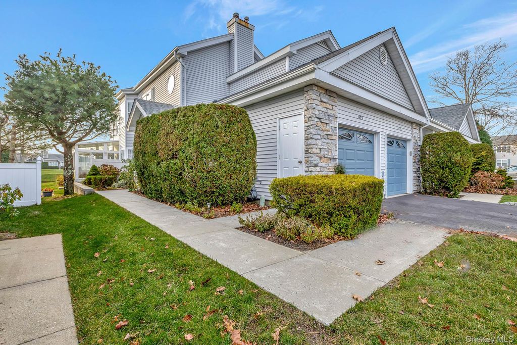 Photo of 477 Woodscreek Court, Moriches, NY 11955 (MLS # 11619162)