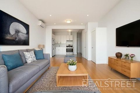 Photo of 9002 Queens Blvd #302, ELMHURST, NY 11373 (MLS # 11799032)