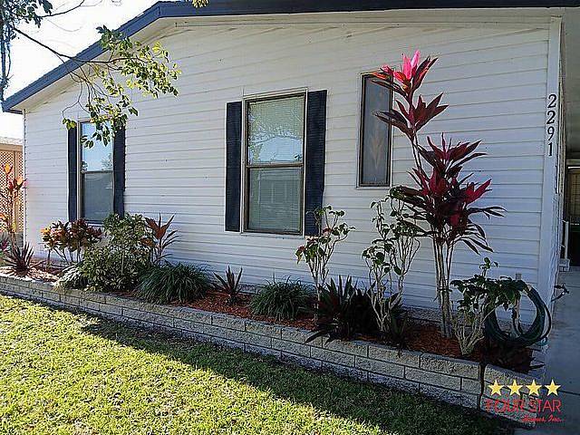 Photo of 2291 Pebble Beach Blvd #646, Orlando, FL 32826 (MLS # 11929387)