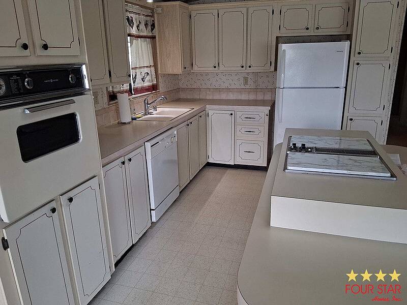 Photo of 2291 Pebble Beach Blvd #646, Orlando, FL 32826 (MLS # 11929387)