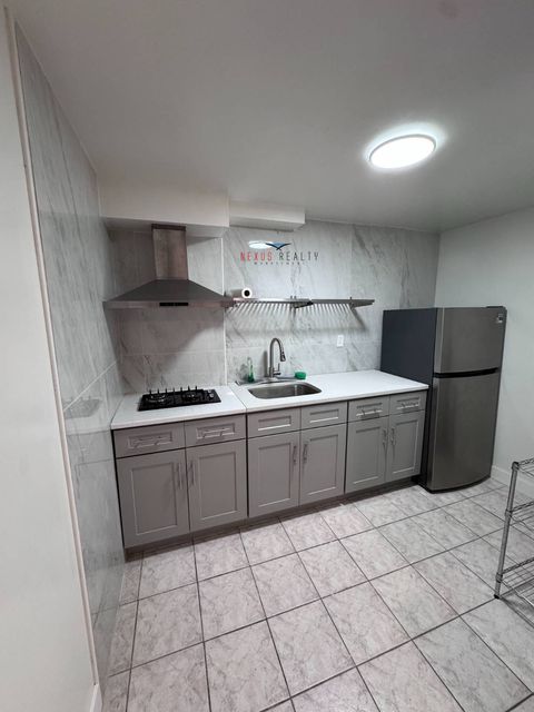 Photo of 3429 69th Street #BSMT, Woodside, NY 11377 (MLS # 11692510)