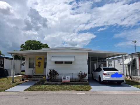 Photo of 2505 E Bay Dr #107, Largo, FL 33771 (MLS # 11687975)