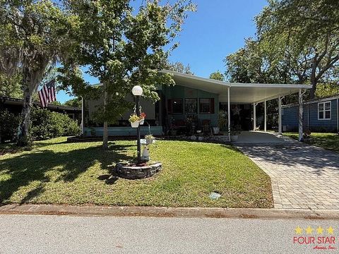 Photo of 7 Hudson Falls Dr, Ormond Beach, FL 32174 (MLS # 11715355)