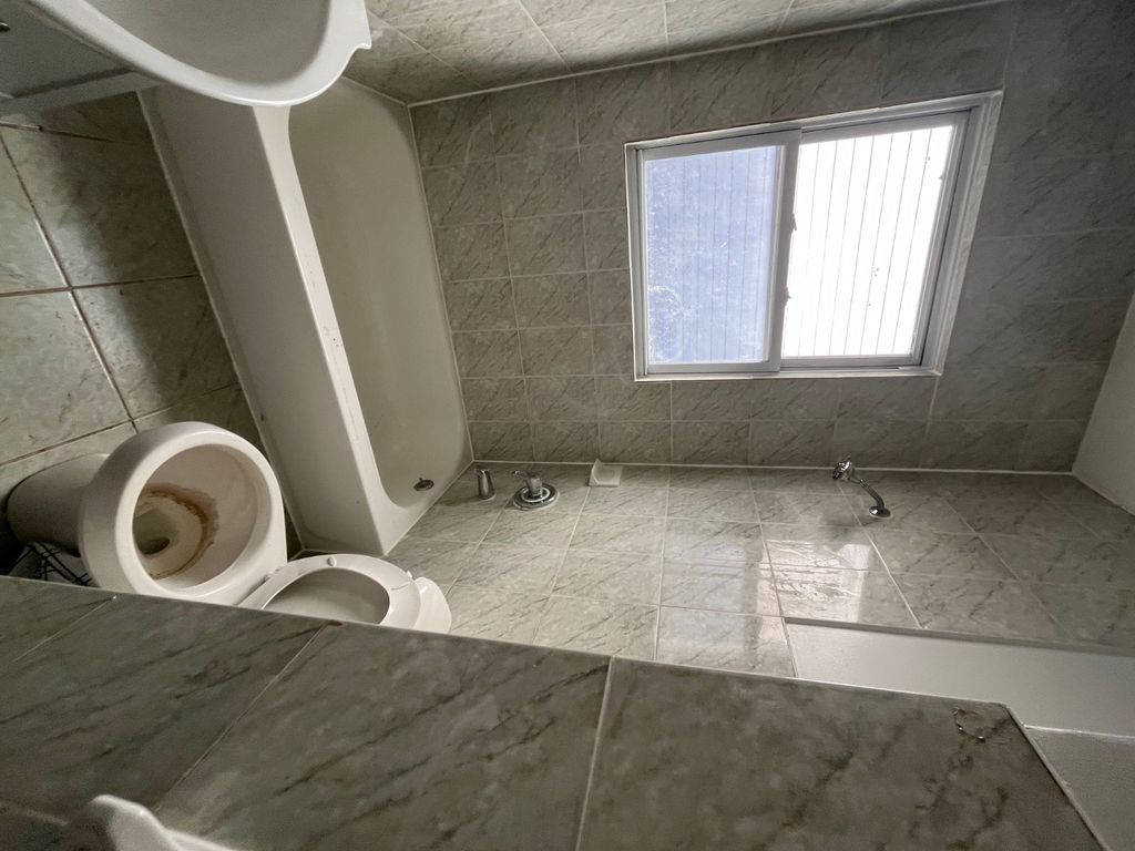 Photo of 7221 Burchell Ave, Far Rockaway, NY 11692 (MLS # 11739934)