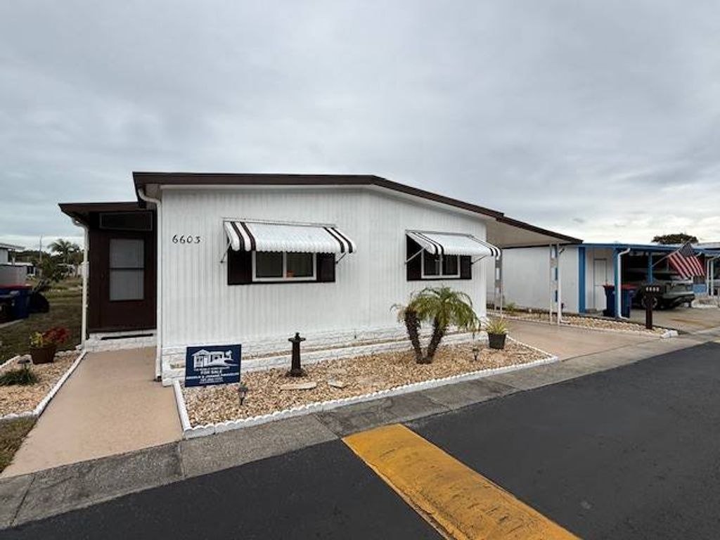 Photo of 6603 Ballad alane Ln, New Port Richey, FL 34653 (MLS # 11620917)