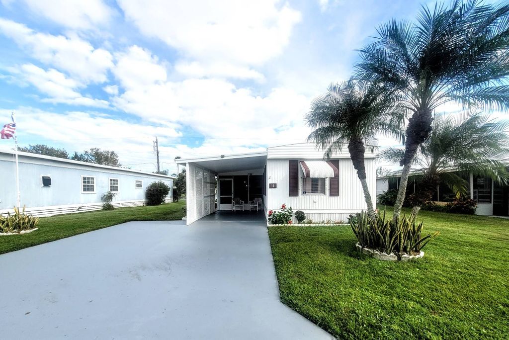 Photo of 5620 Lake Lizzie Dr #11, Saint Cloud, FL 34771 (MLS # 11621964)