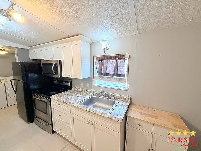 Photo of 24 Palm Castle Drive, Port Orange, FL 32127 (MLS # 11852301)