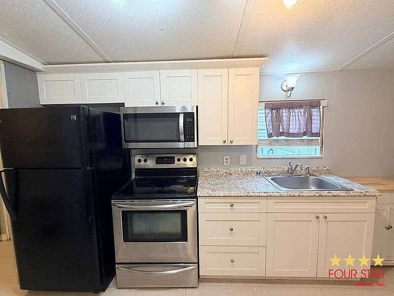 Photo of 24 Palm Castle Drive, Port Orange, FL 32127 (MLS # 11852301)