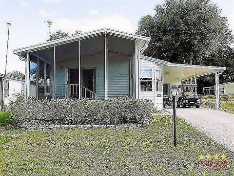 Photo of 6620 Hopi Trl, Leesburg, FL 34748 (MLS # 11741873)