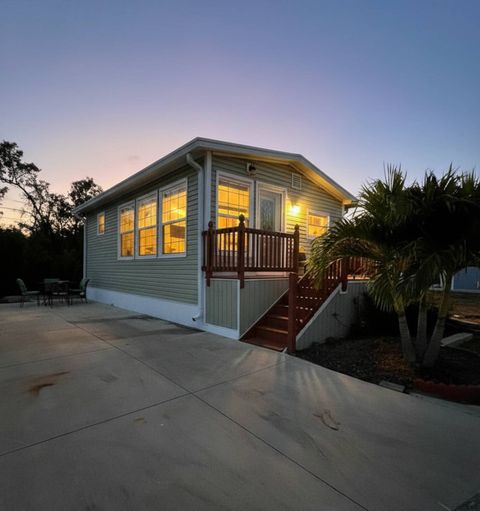 Photo of 962 Sitka Trail, Fort Myers Beach, FL 33931 (MLS # 11665016)