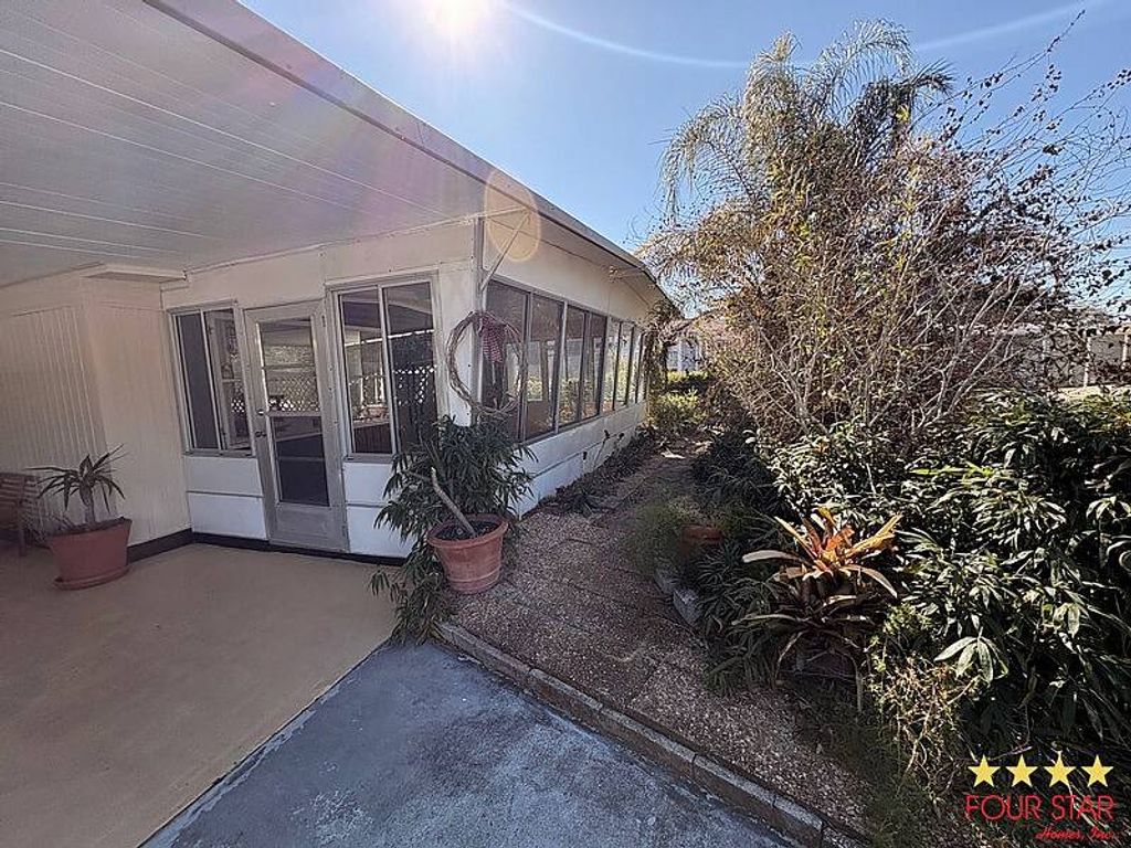 Photo of 644 Cherry Tree Lane, DeLand, FL 32724 (MLS # 11641682)