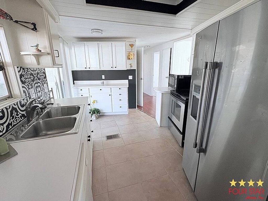 Photo of 644 Cherry Tree Lane, DeLand, FL 32724 (MLS # 11641682)