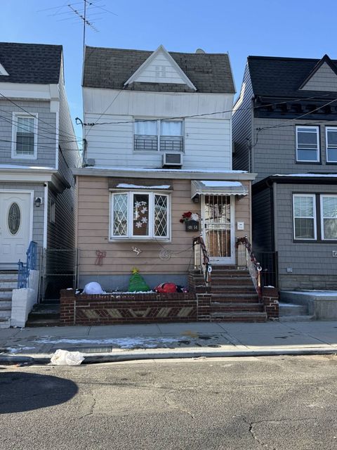 Photo of 10154 103rd Street, Ozone Park, NY 11416 (MLS # 11673380)