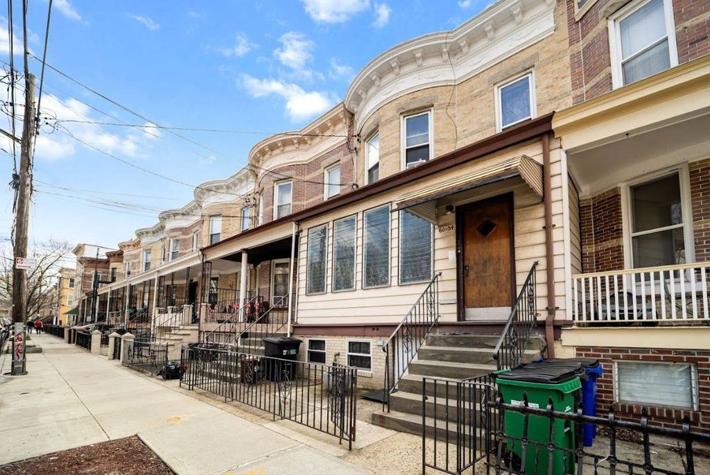 Photo of 6034 69th Ave, New York, NY 11385 (MLS # 11679620)