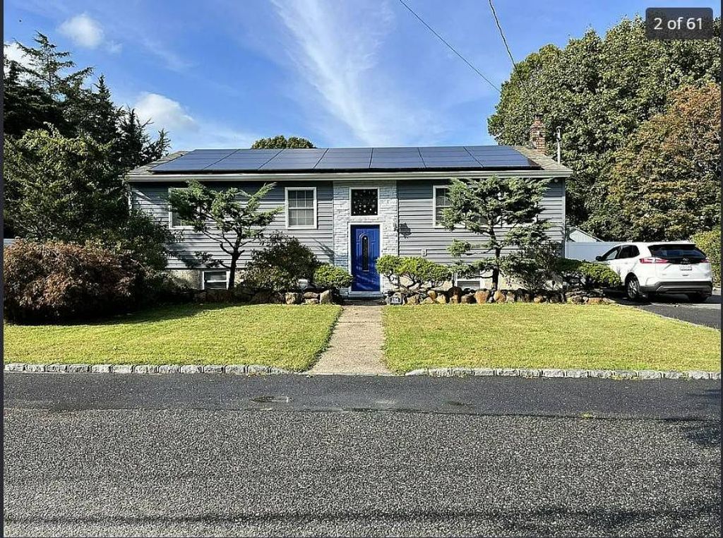 Photo of 401 20th St, WADING RIVER, NY 11792 (MLS # 11618657)