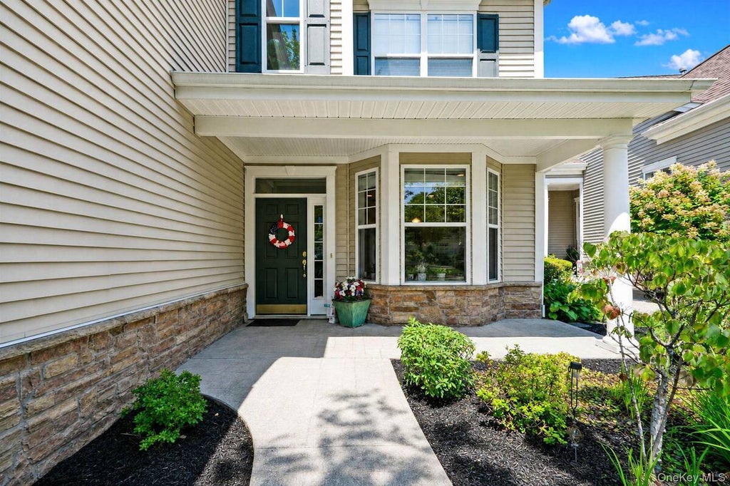 Photo of 140 Chopin Place, Eastport, NY 11941 (MLS # 11931065)