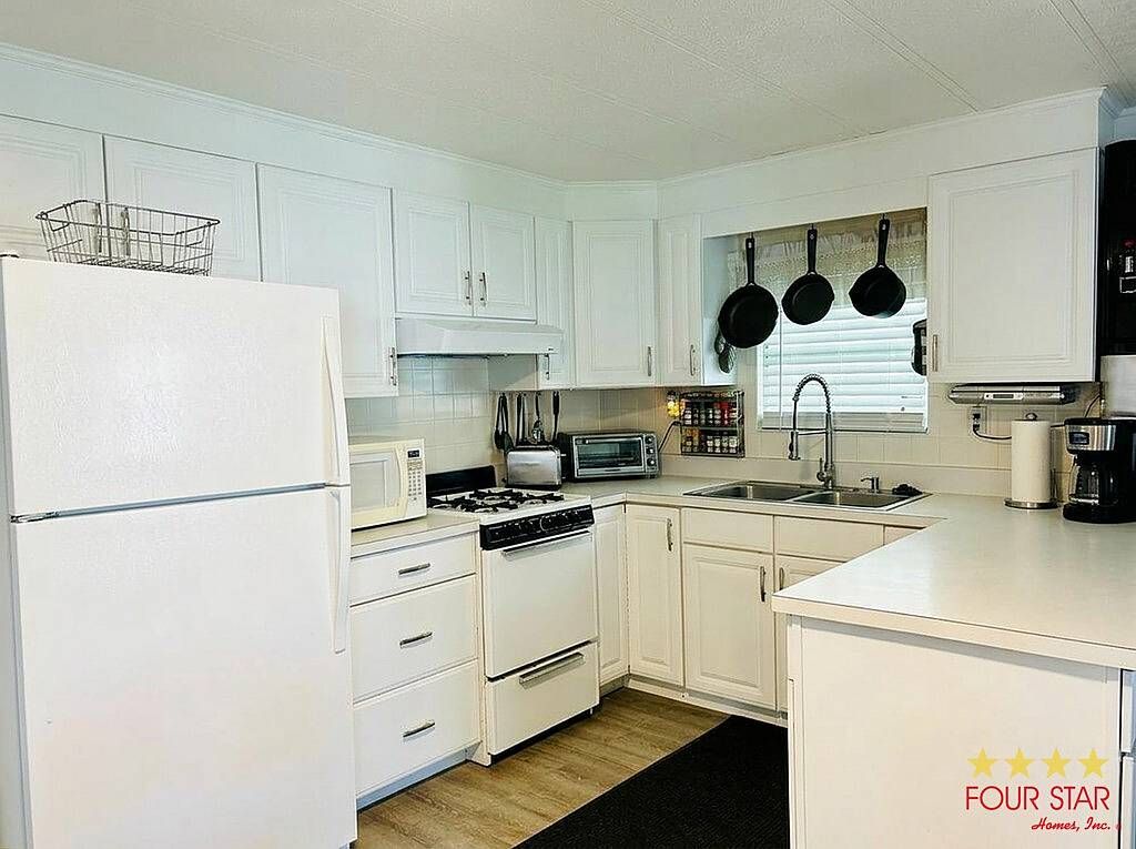 Photo of 106 Dora Ave #23, Tavares, FL 32778 (MLS # 11742213)
