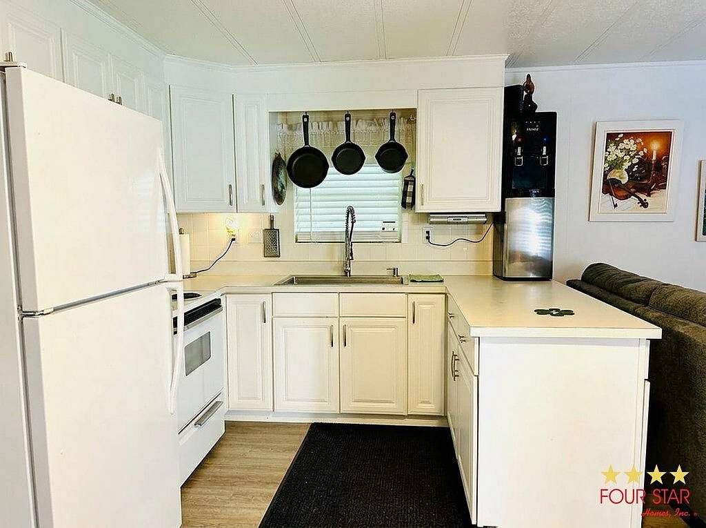 Photo of 106 Dora Ave #23, Tavares, FL 32778 (MLS # 11742213)