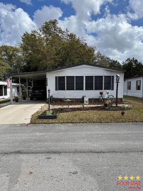 Photo of 14526 Pine Valley Rd #525, Orlando, FL 32826 (MLS # 11669435)