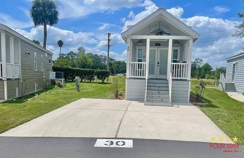 Photo of 30 Merry Men Dr, Kissimmee, FL 34746 (MLS # 11715351)