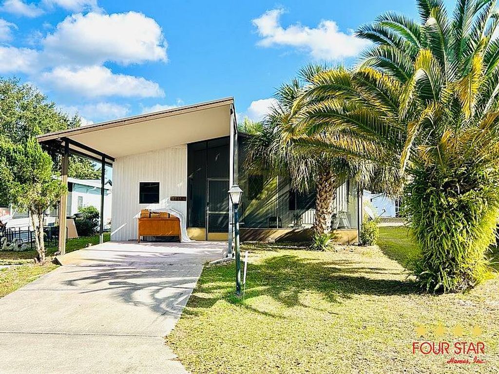 Photo of 6618 Hopi Trl, Leesburg, FL 34748 (MLS # 11623218)