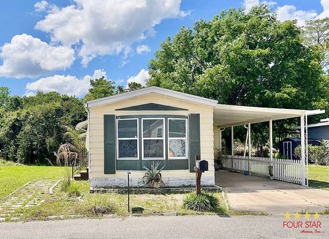 Photo of 148 Durham Cir, Kissimmee, FL 34746 (MLS # 11715350)